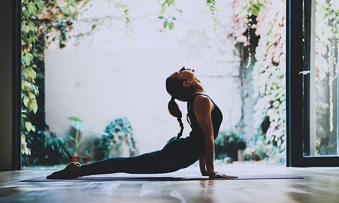 photo of a woman doing yoga